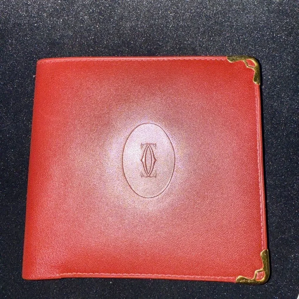 Never used Cartier red burgundy wallet comes with original box